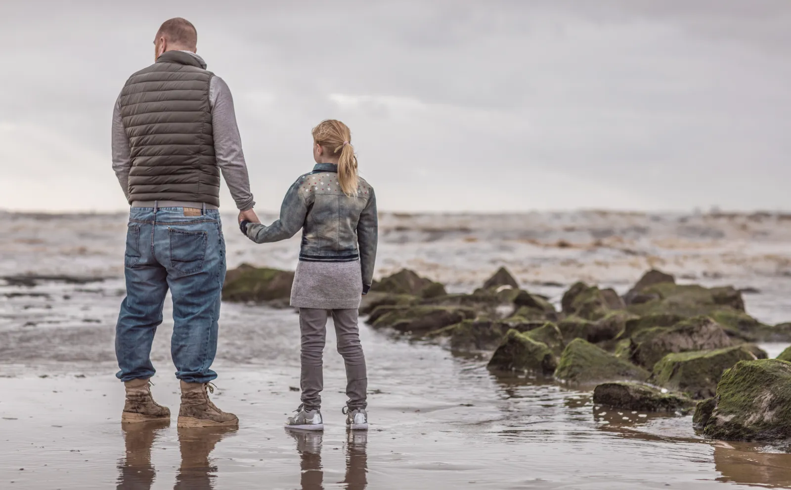 Parent and child walking outdoors